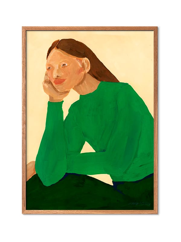 plakat af kvinde med en grøn trøje, brunt hår og sorte bukser